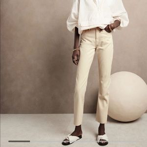 High rise straight leg white/“ecru” jeans.